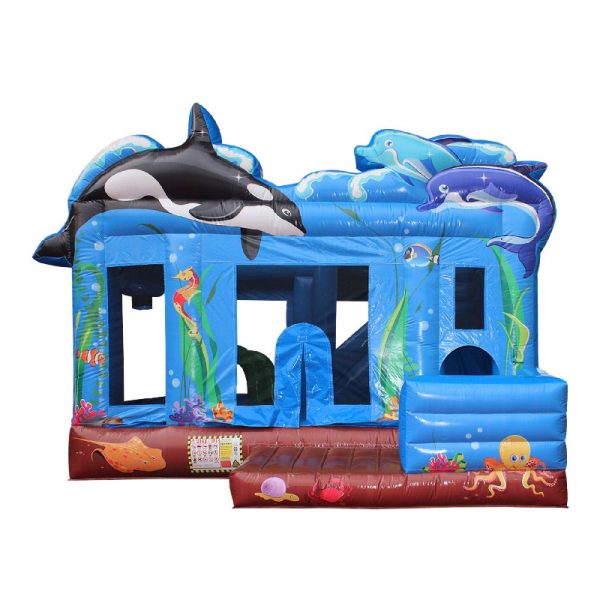 Sea themed inflatable bounce house featuring an Orca whale, dolphins and other sea creatures.