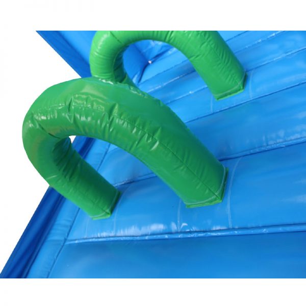 Green and blue bouncy castle obstacles.
