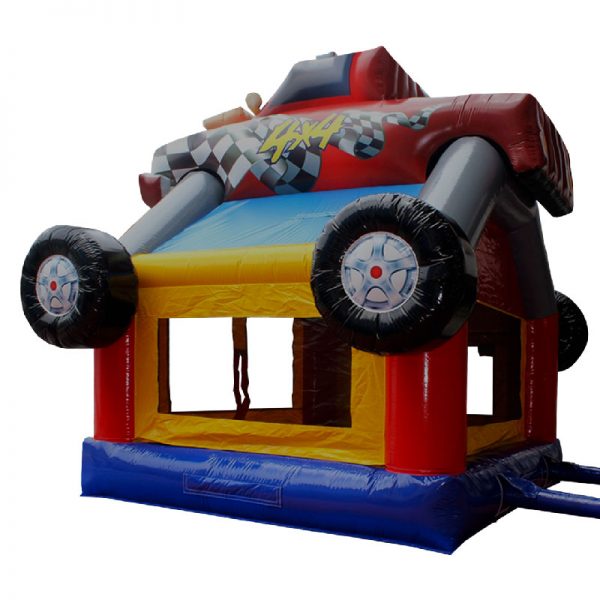 Monster Truck bounce house side view. Blue red and yellow inflatable with a monster truck 3D design mounted on top.