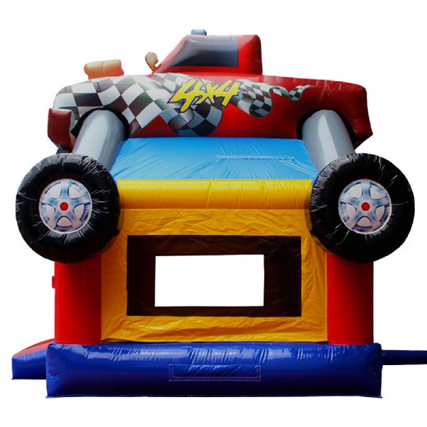 Monster Truck bounce house side view. Blue red and yellow inflatable with a monster truck 3D design mounted on top.