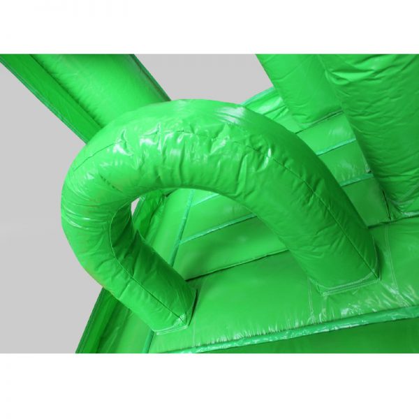 Green obstacle in a green bouncy castle.
