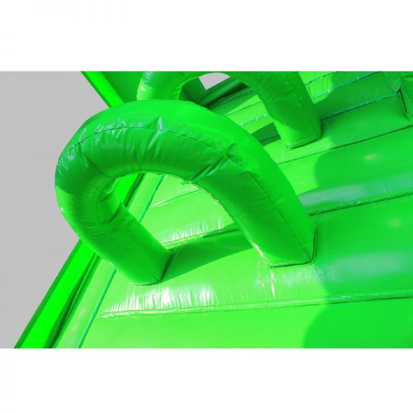 Green bouncy castle obstacles.